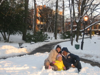 Family playin in snow